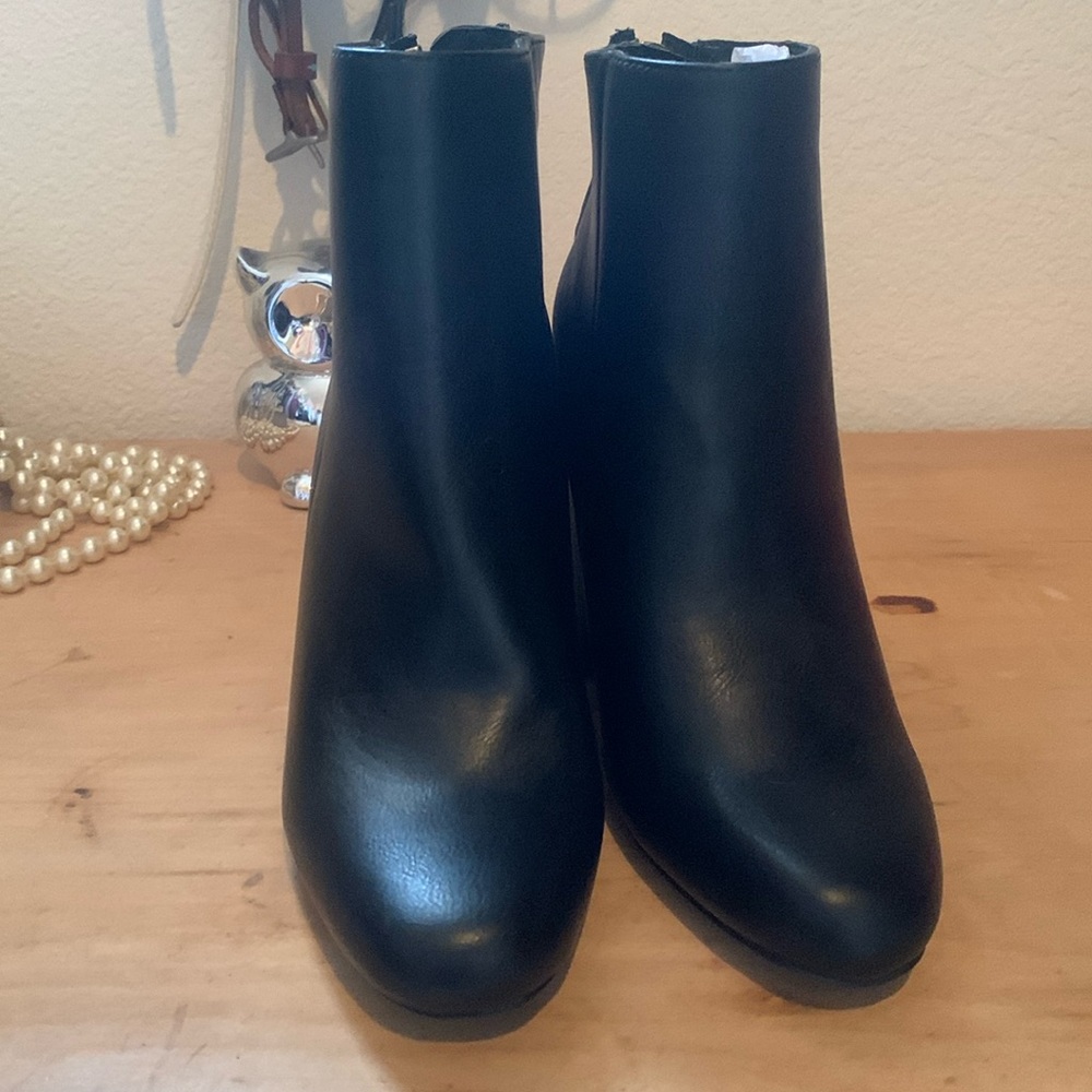 Brand new, never work heeled booties.